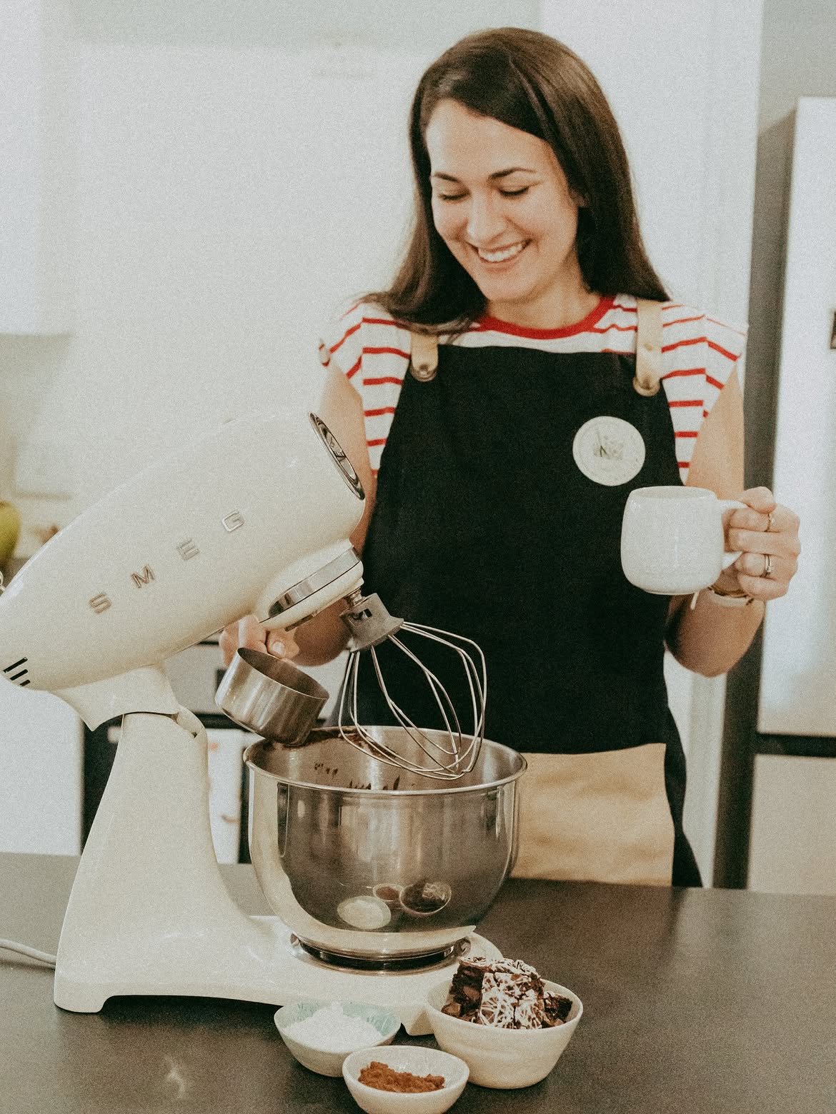 Baker mixing batter in the Guten Morgen kitchen